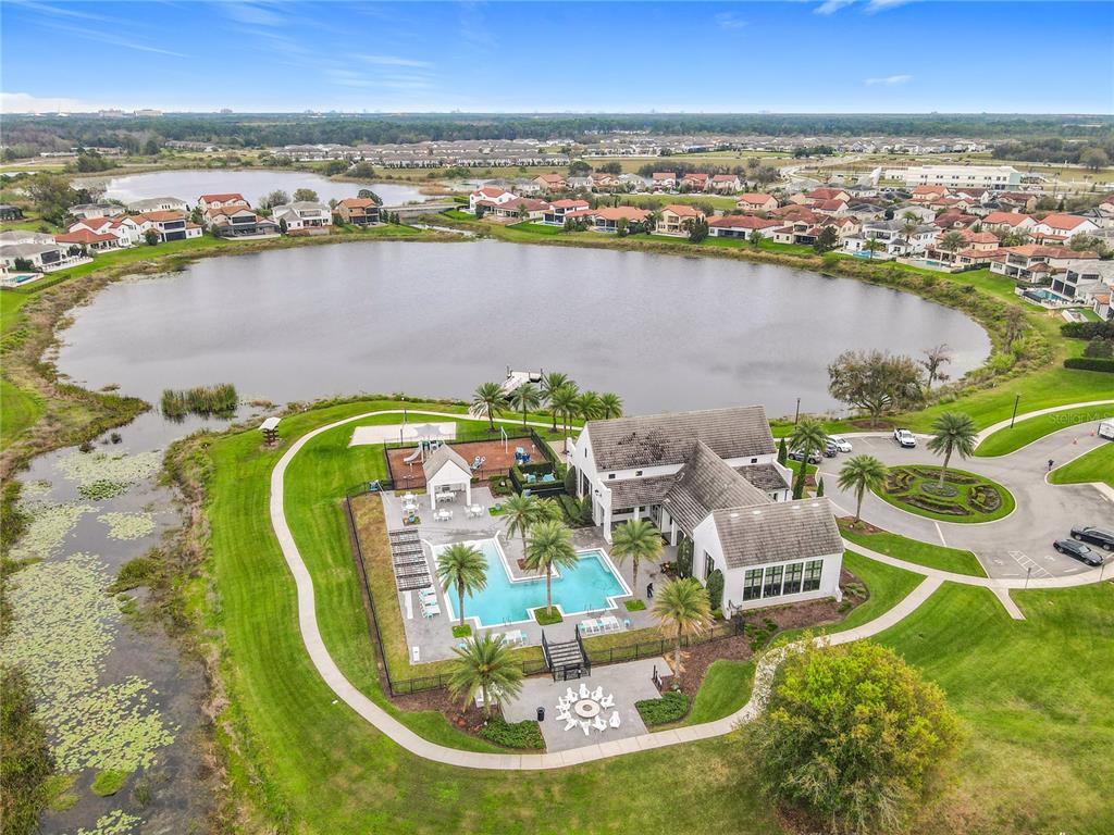 8325 Topsail Place Winter Garden, FL 34787 - Photo 67 of 74 an aerial view of a house with outdoor seating lake and city view