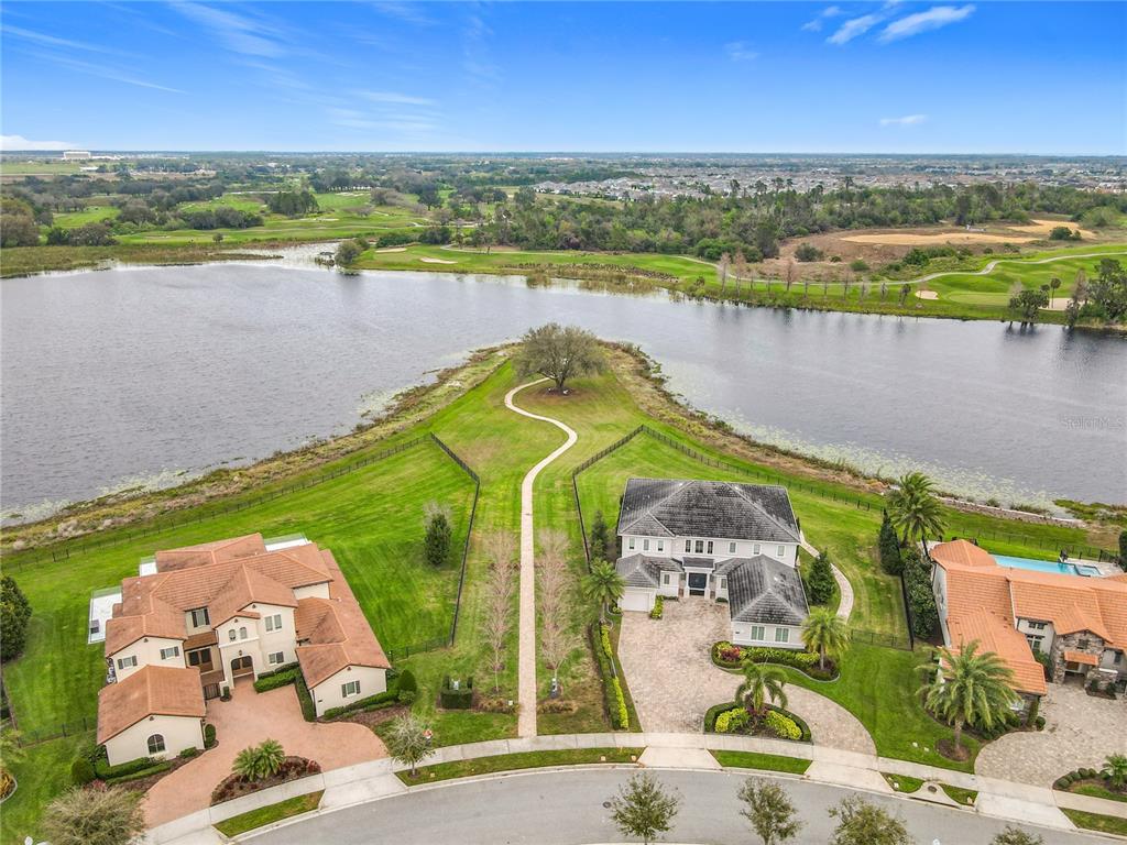 8325 Topsail Place Winter Garden, FL 34787 - Photo 69 of 74 an aerial view of a city with houses