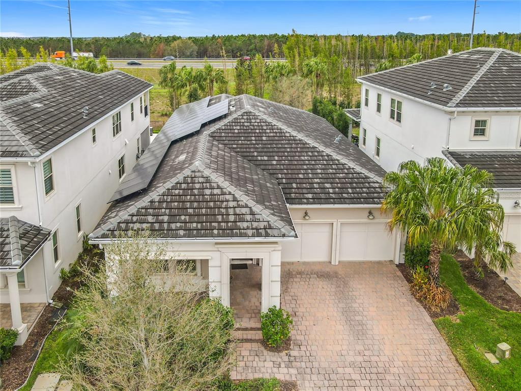 8325 Topsail Place Winter Garden, FL 34787 - Photo 7 of 74 a aerial view of a house next to a yard