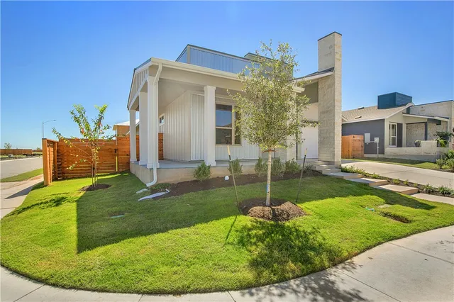 a house view with a garden space