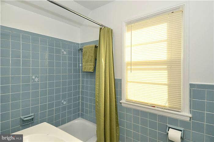 1018 Carson Street Silver Spring, MD 20901 - Photo 14 of 20 a bathroom with a shower