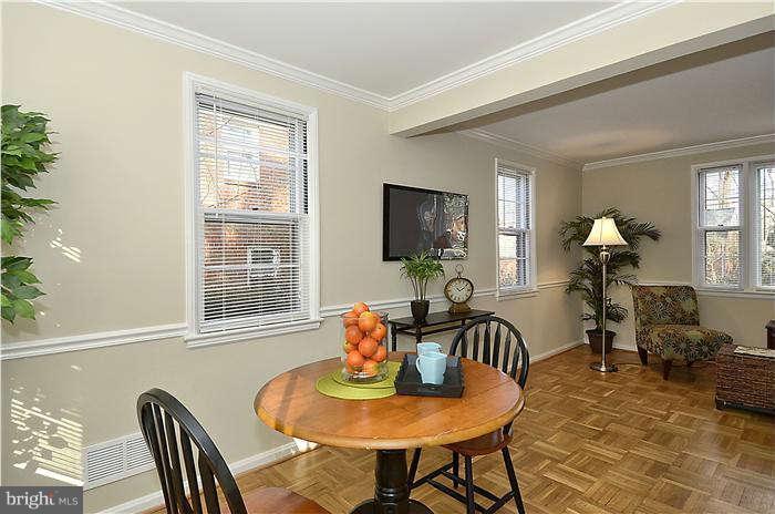 1018 Carson Street Silver Spring, MD 20901 - Photo 5 of 20 a living room with furniture a flat screen tv and a window