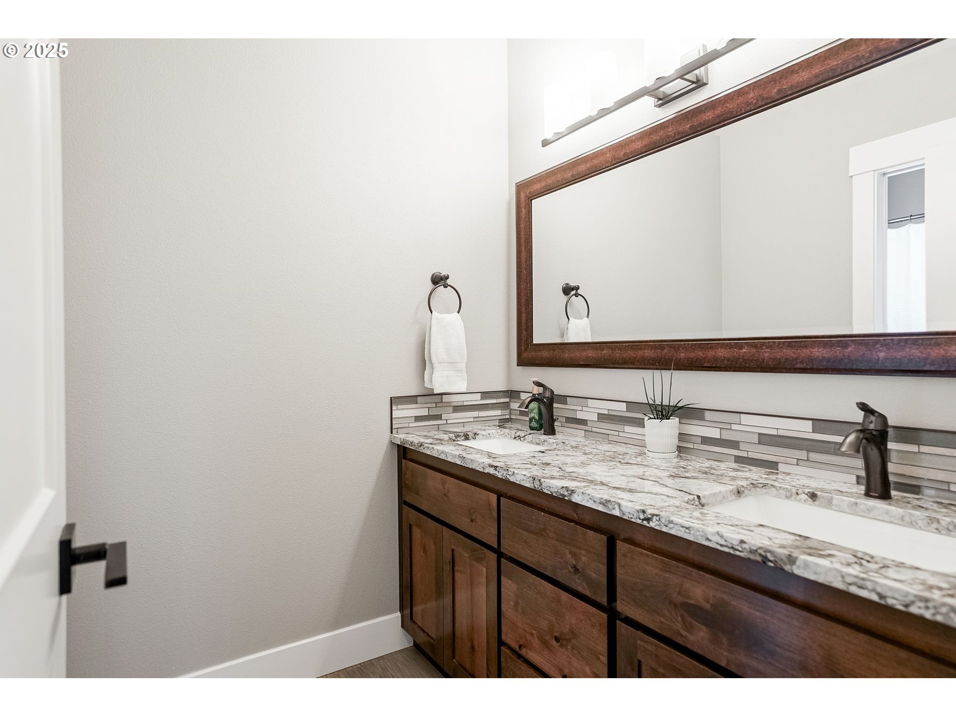 6300 Corvallis Road Independence, OR 97351 - Photo 30 of 48 a bathroom with a granite countertop sink and a mirror