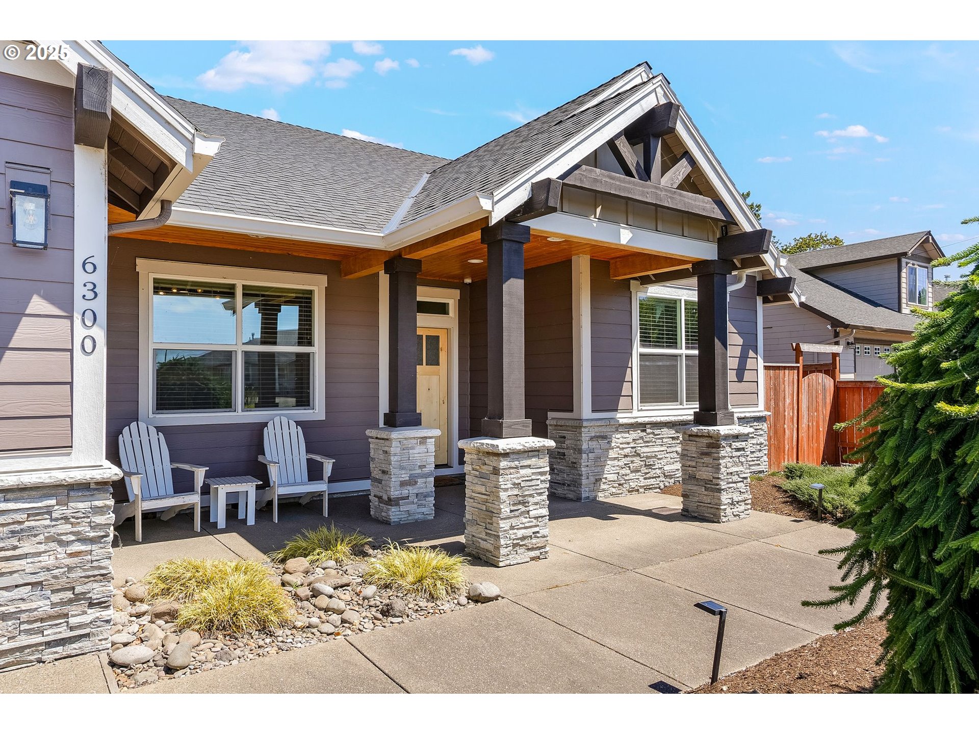 6300 Corvallis Road Independence, OR 97351 - Photo 3 of 48 a patio with a table and chairs and potted plants