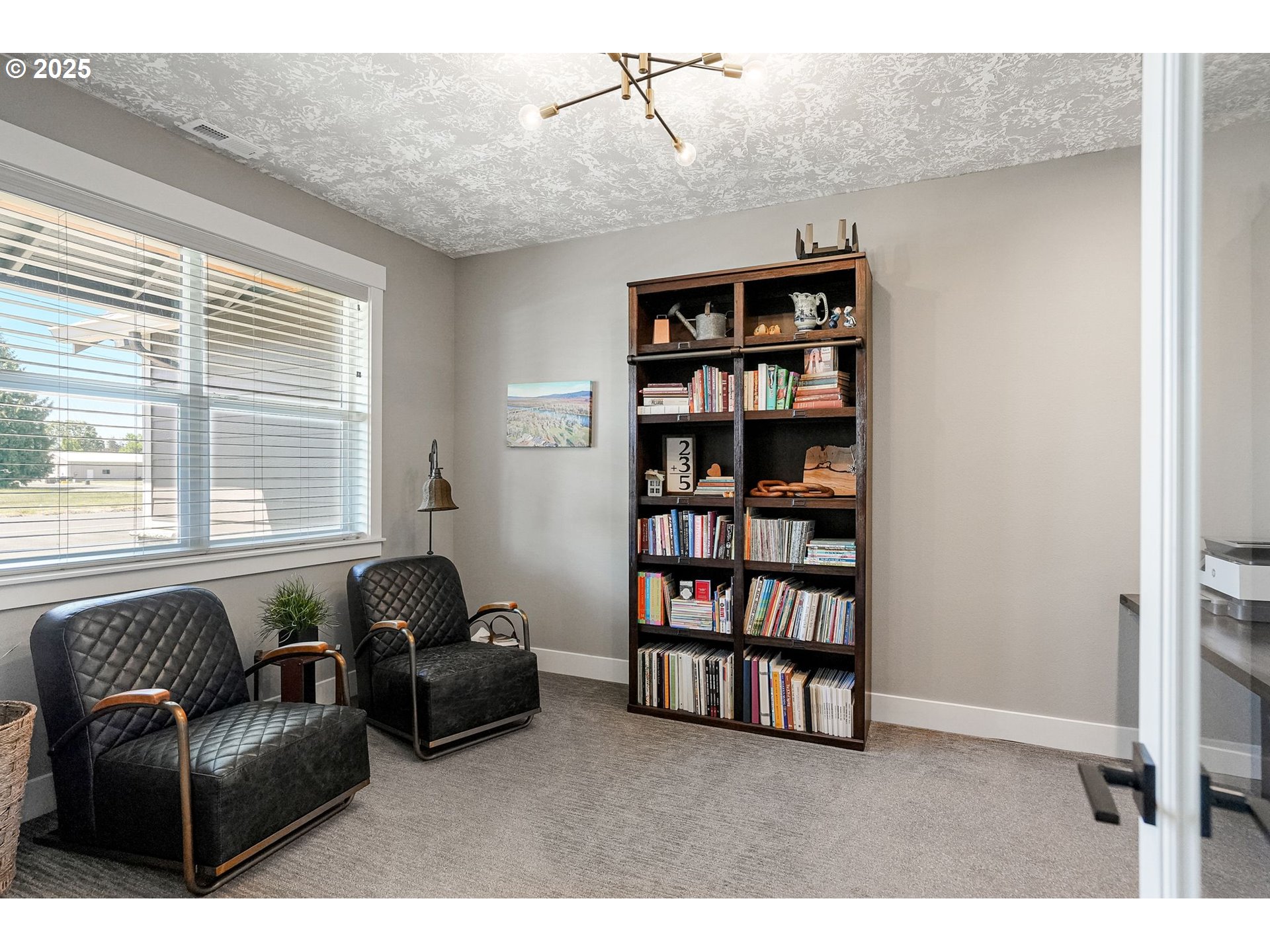 6300 Corvallis Road Independence, OR 97351 - Photo 5 of 48 a living room with furniture and a book shelf