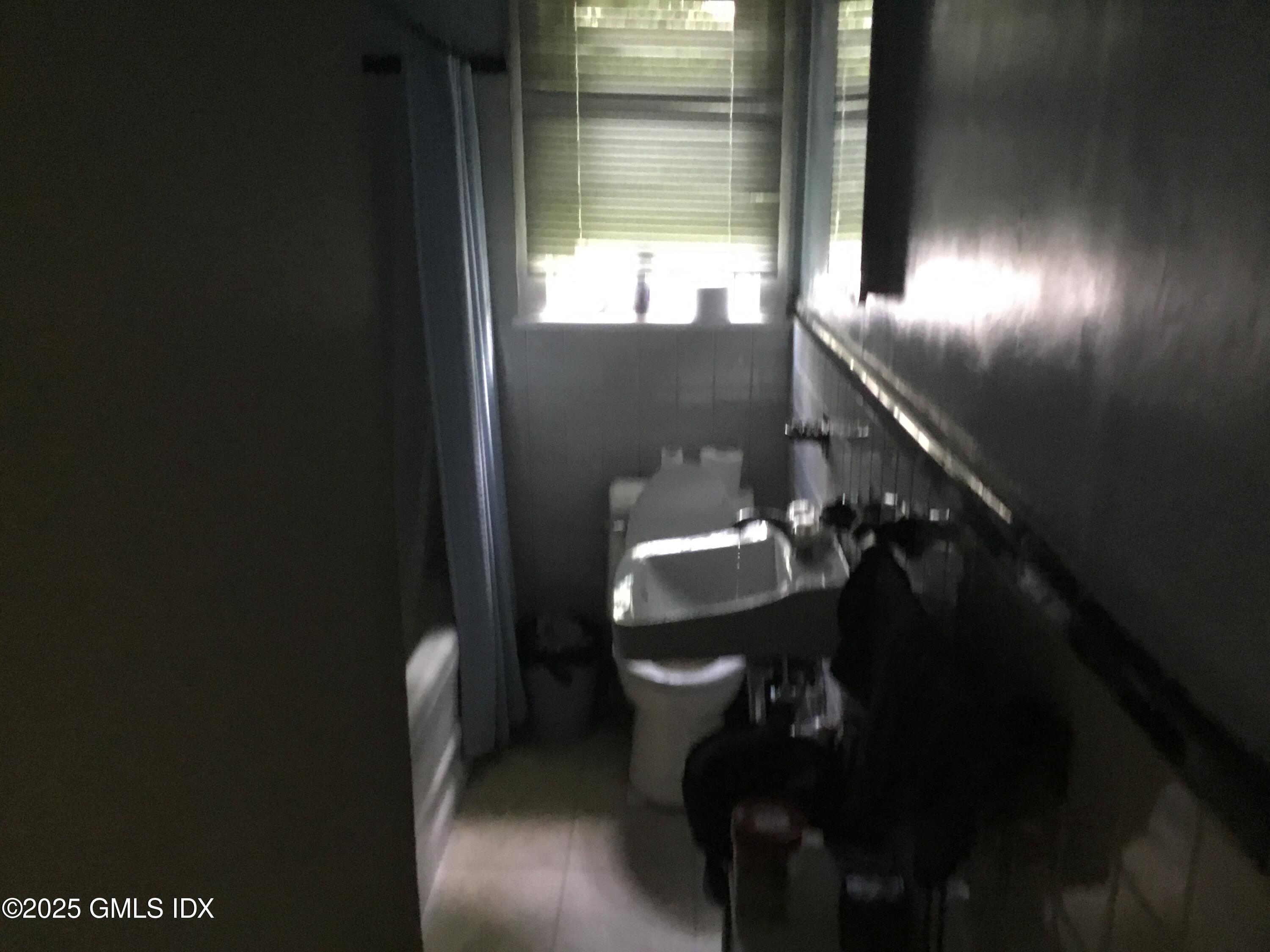 14 Sherman Avenue Greenwich, CT 06830 - Photo 12 of 27 a bathroom with a toilet