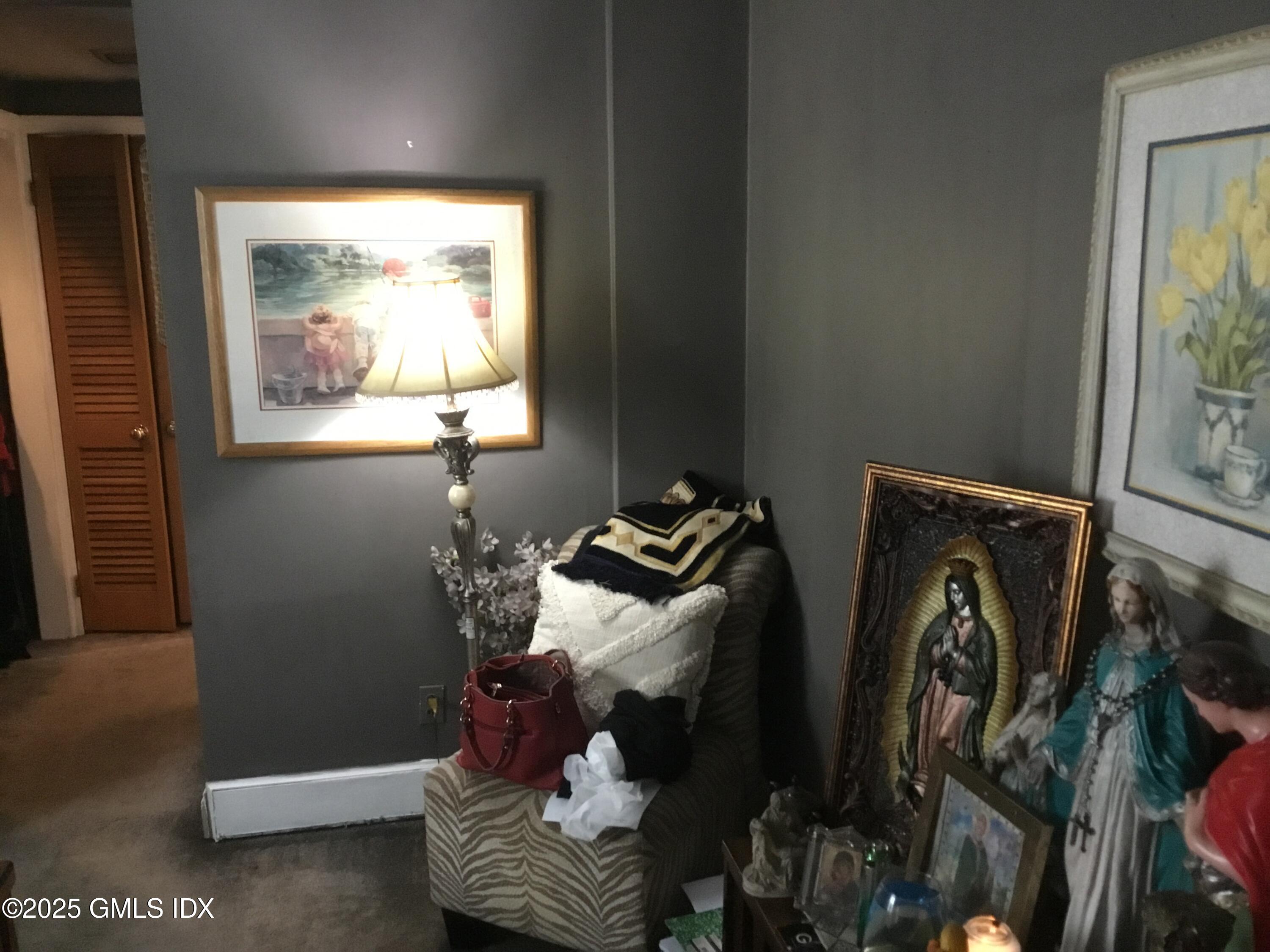 14 Sherman Avenue Greenwich, CT 06830 - Photo 18 of 27 a view of walk in closet with clothes and shoes