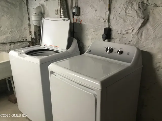a utility room with dryer and washer