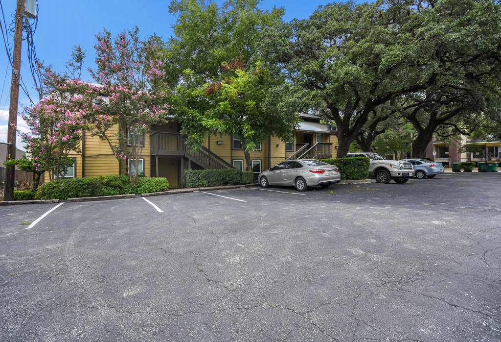 1000 West 26th Street, Unit 209 Austin, TX 78705 - Photo 19 of 20 a view of street with parked cars