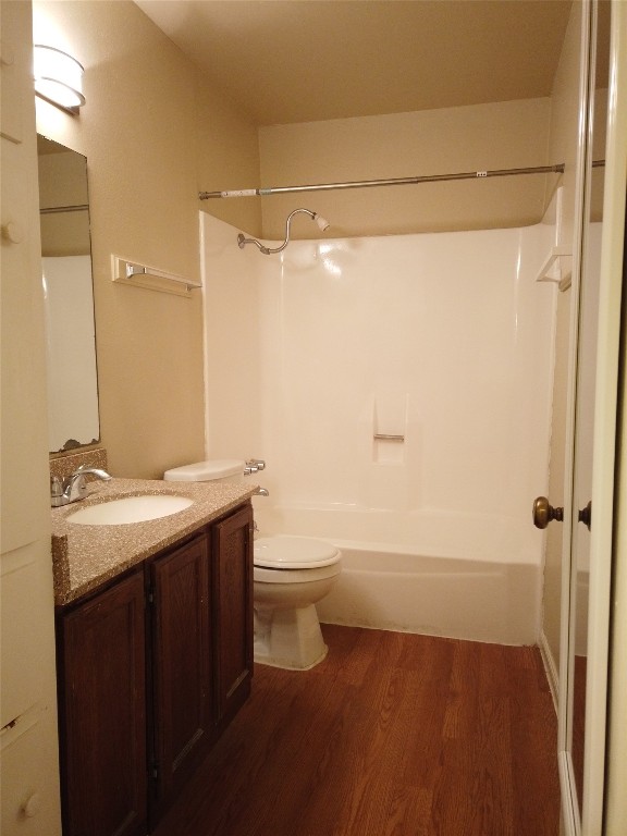 1000 West 26th Street, Unit 209 Austin, TX 78705 - Photo 10 of 20 a bathroom with a granite countertop sink toilet and shower