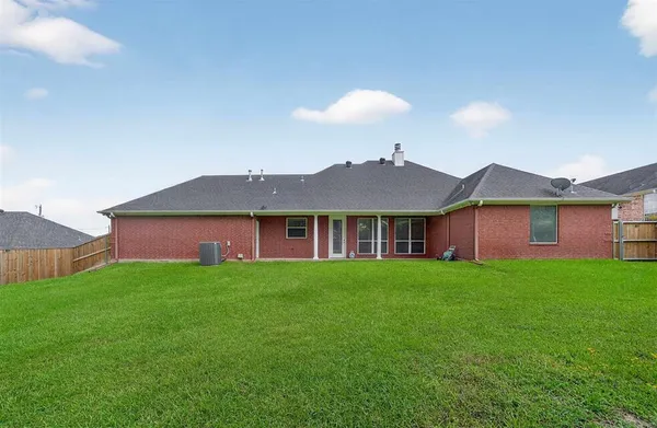 a view of a yard in front of a house with a yard