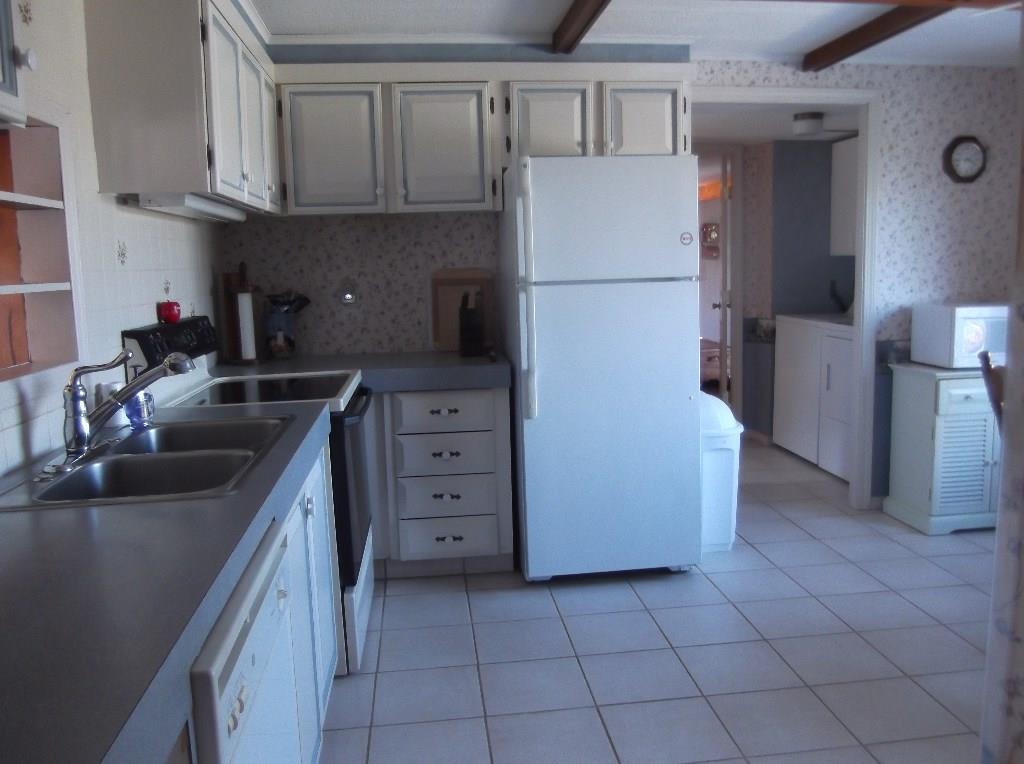 1235 Dexter Road Dover-Foxcroft, ME 04426 - Photo 7 of 26 Kitchen with entry to laundry.
