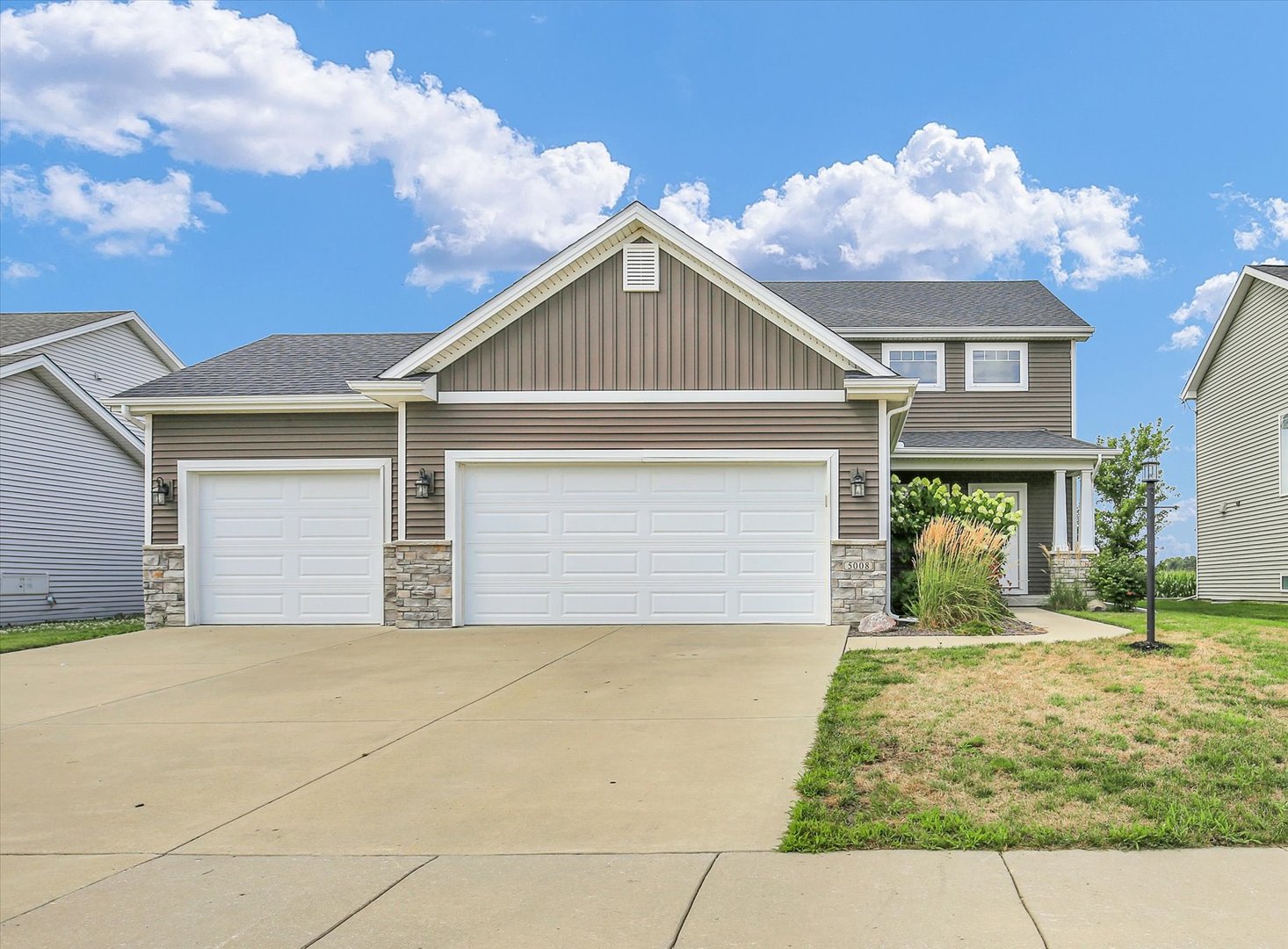 5008 Emmas Way Champaign, IL 61822 - Photo 1 of 53 front view of a house with a yard