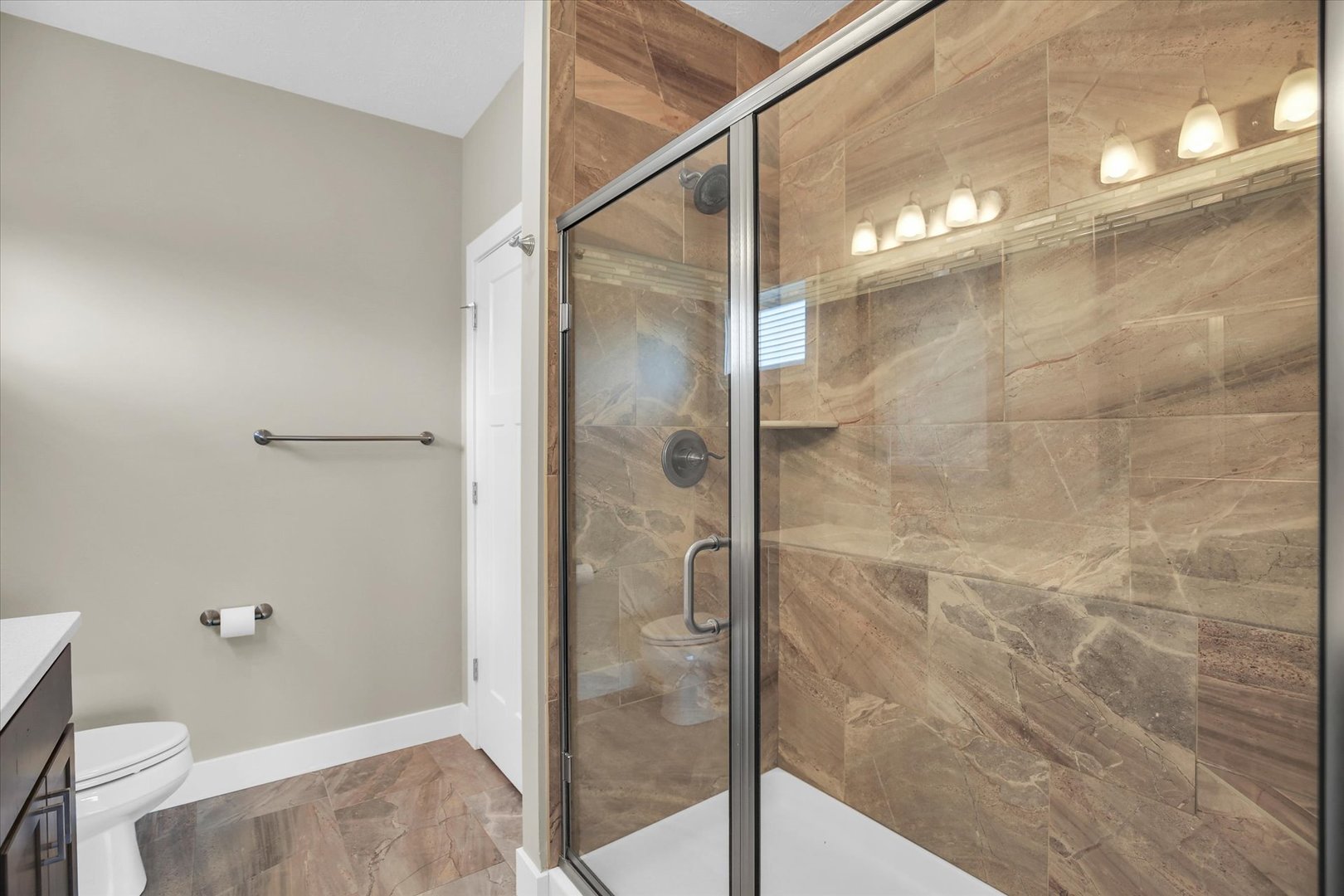 5008 Emmas Way Champaign, IL 61822 - Photo 23 of 53 a bathroom with a shower and a toilet