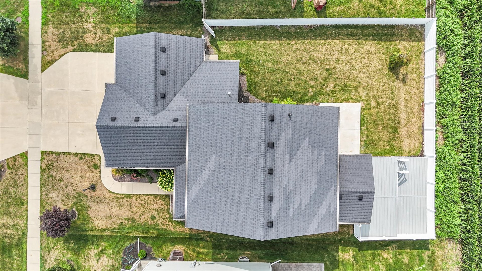 5008 Emmas Way Champaign, IL 61822 - Photo 43 of 53 an aerial view of a house with a yard and large tree