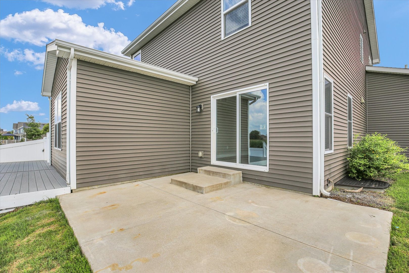 5008 Emmas Way Champaign, IL 61822 - Photo 45 of 53 a view of a house with a yard and garage
