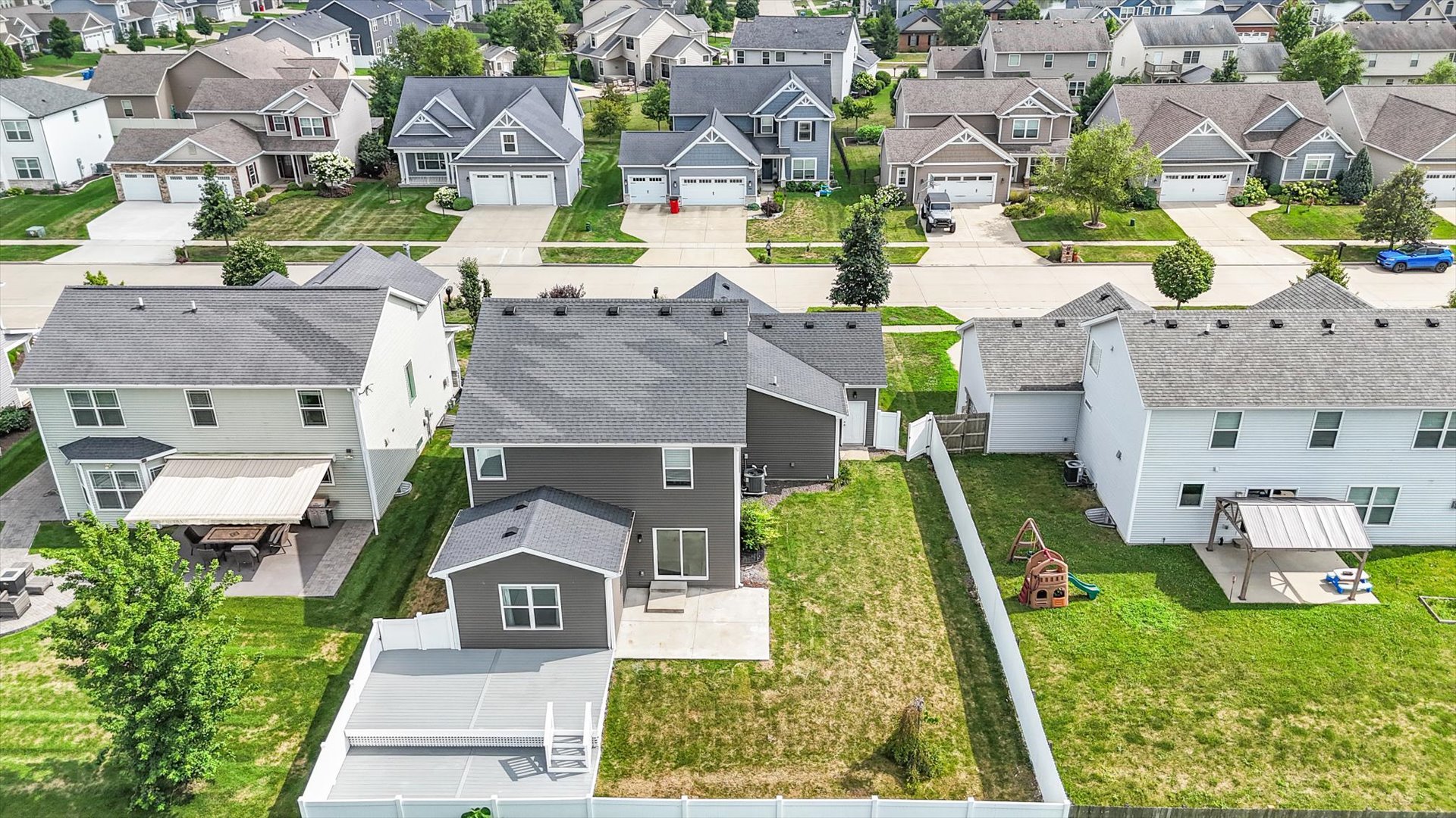 5008 Emmas Way Champaign, IL 61822 - Photo 51 of 53 an aerial view of a house with a garden and yard