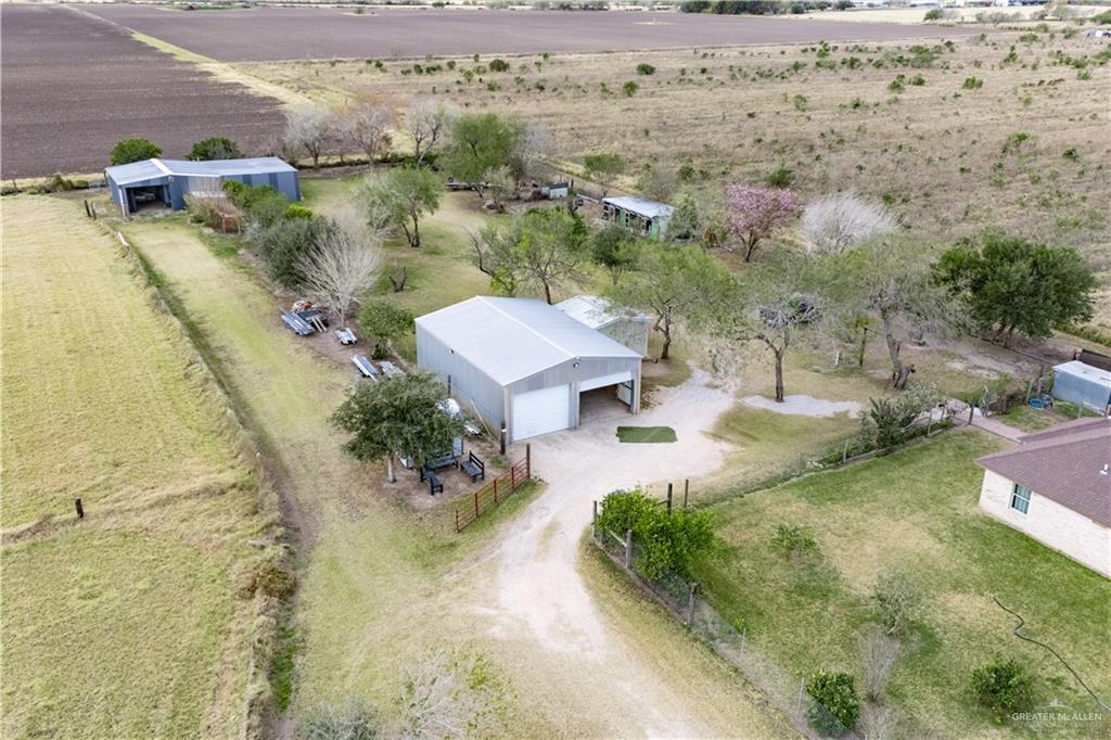 32516 El Preseno Road San Benito, TX 78586 - Photo 35 of 45 an aerial view of a house with a yard