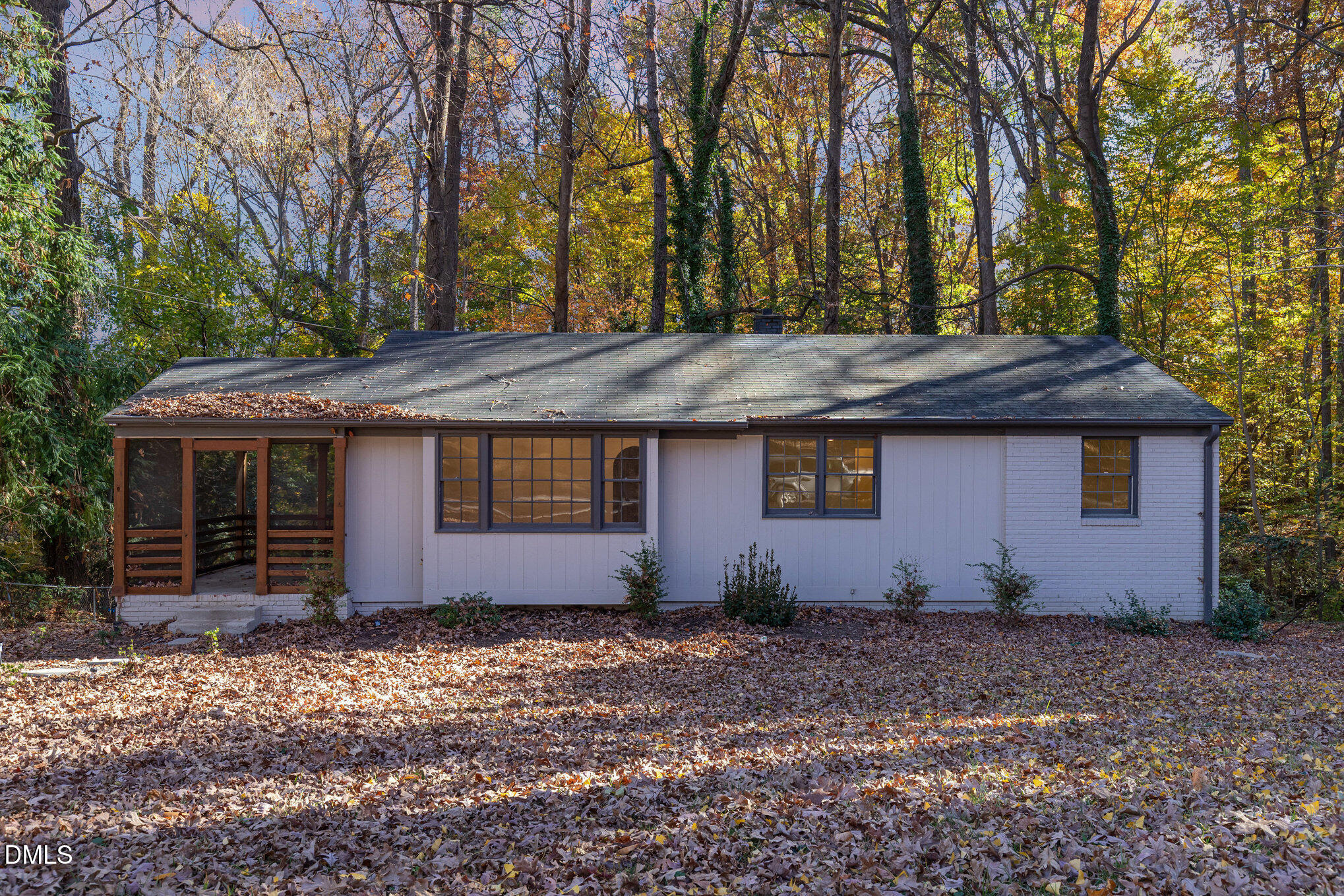 608 Dennis Avenue Raleigh, NC 27604 - Photo 1 of 30 a view of house with trees in the background