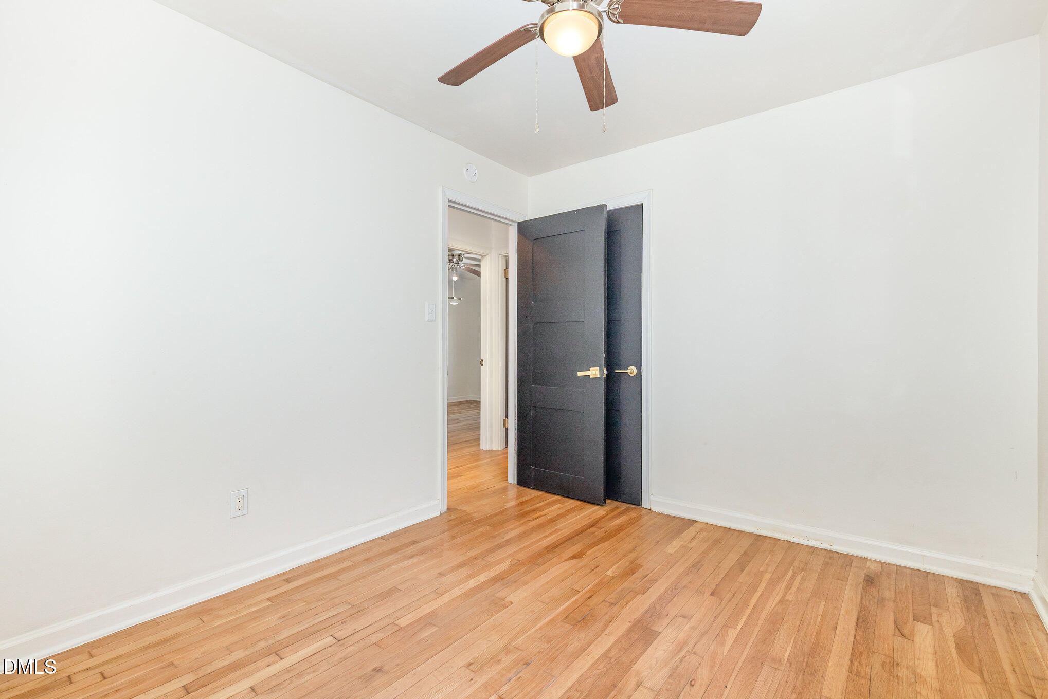 608 Dennis Avenue Raleigh, NC 27604 - Photo 16 of 30 a view of empty room with wooden floor