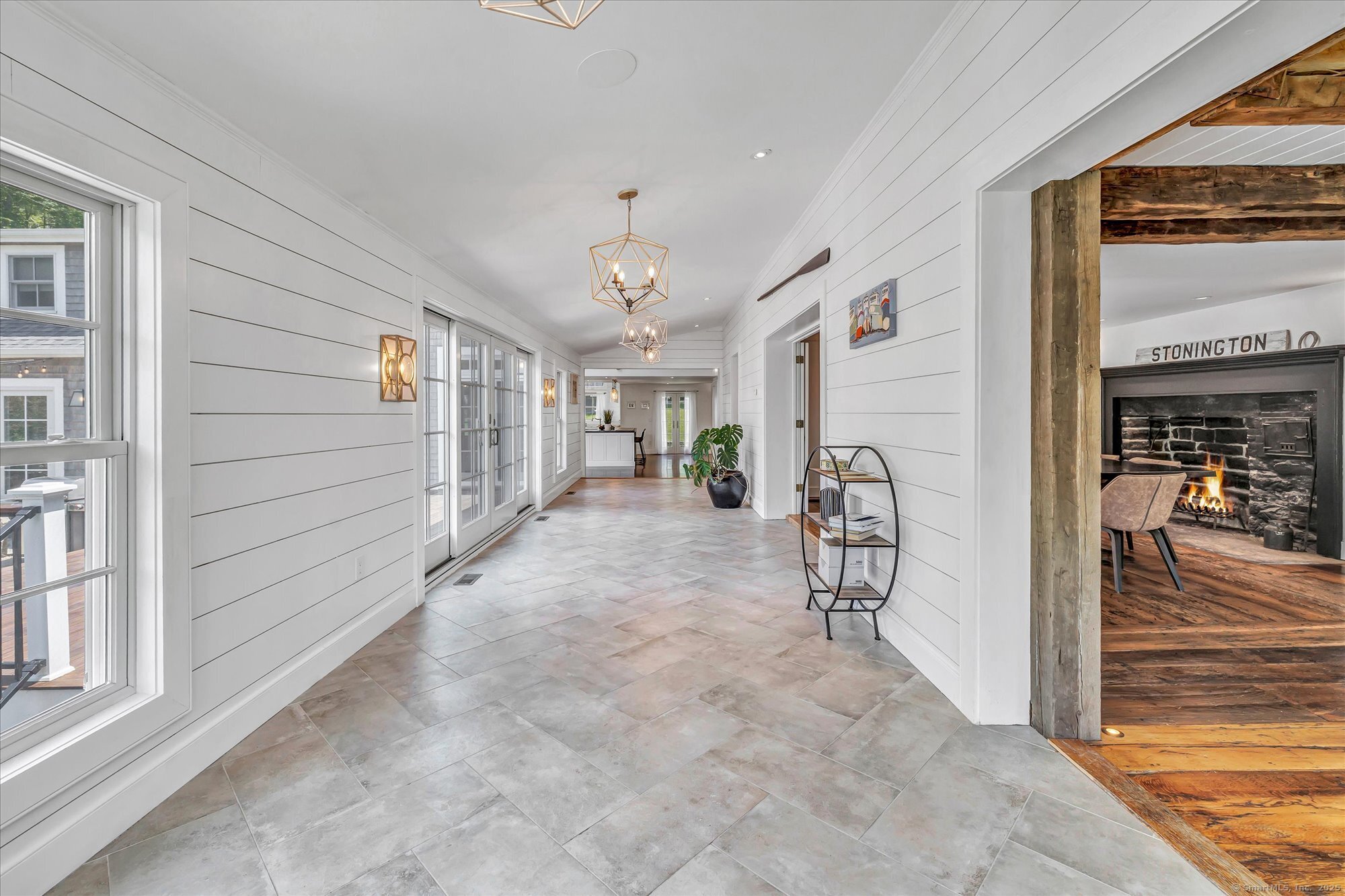 188 Wolf Neck Road Stonington, CT 06378 - Photo 16 of 40 a view of a livingroom with a furniture and a window