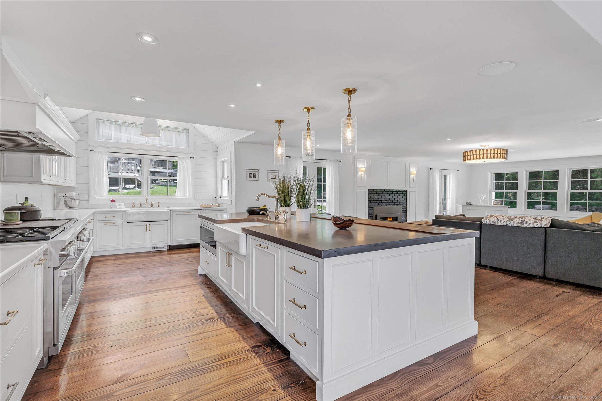 188 Wolf Neck Road Stonington, CT 06378 - Photo 23 of 40 a large kitchen with stainless steel appliances and a sink