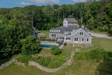 an aerial view of a house with a garden