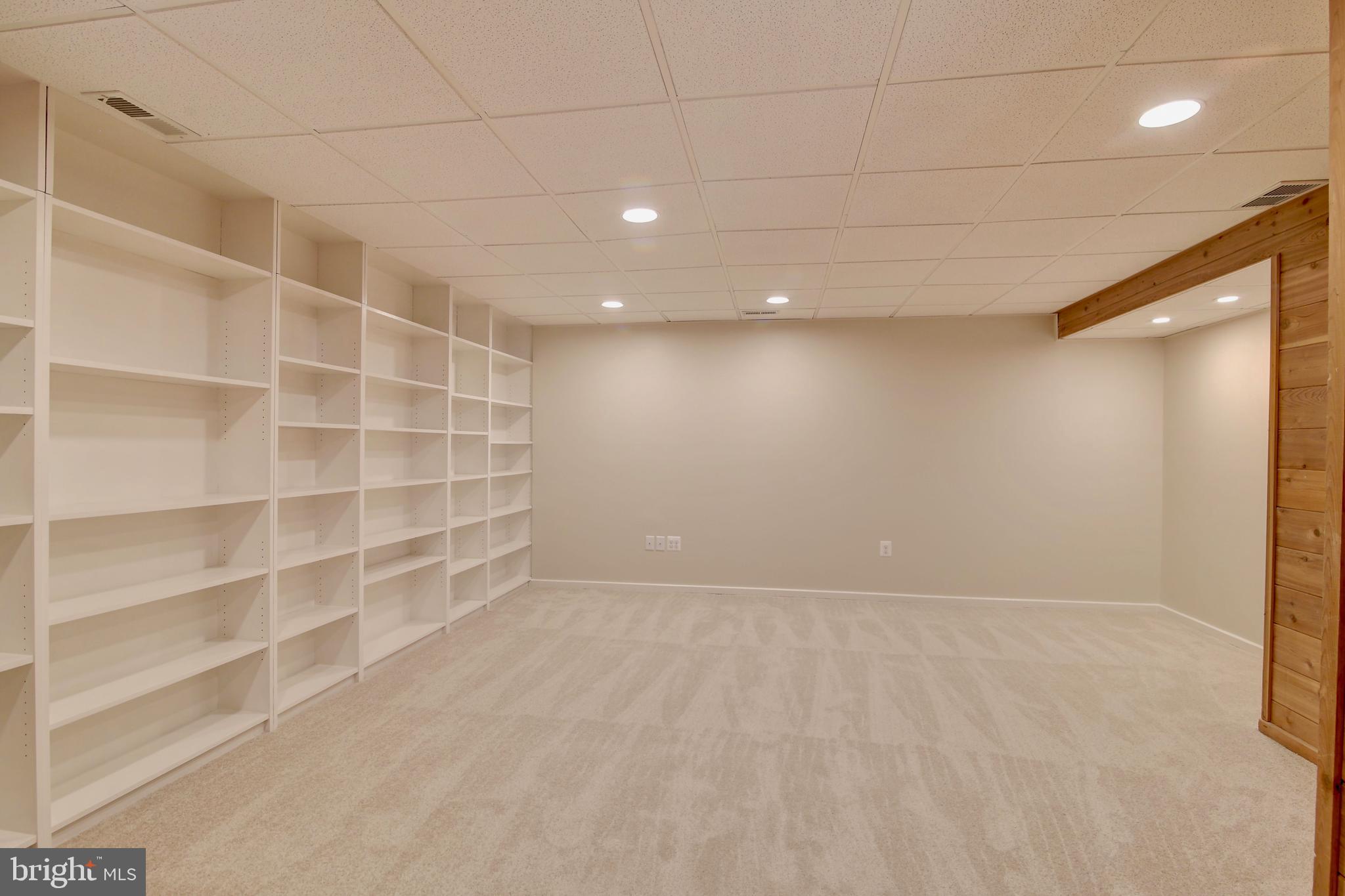19990 Gleedsville Road Leesburg, VA 20175 - Photo 31 of 53 Basement multi-purpose room with built-in shelving