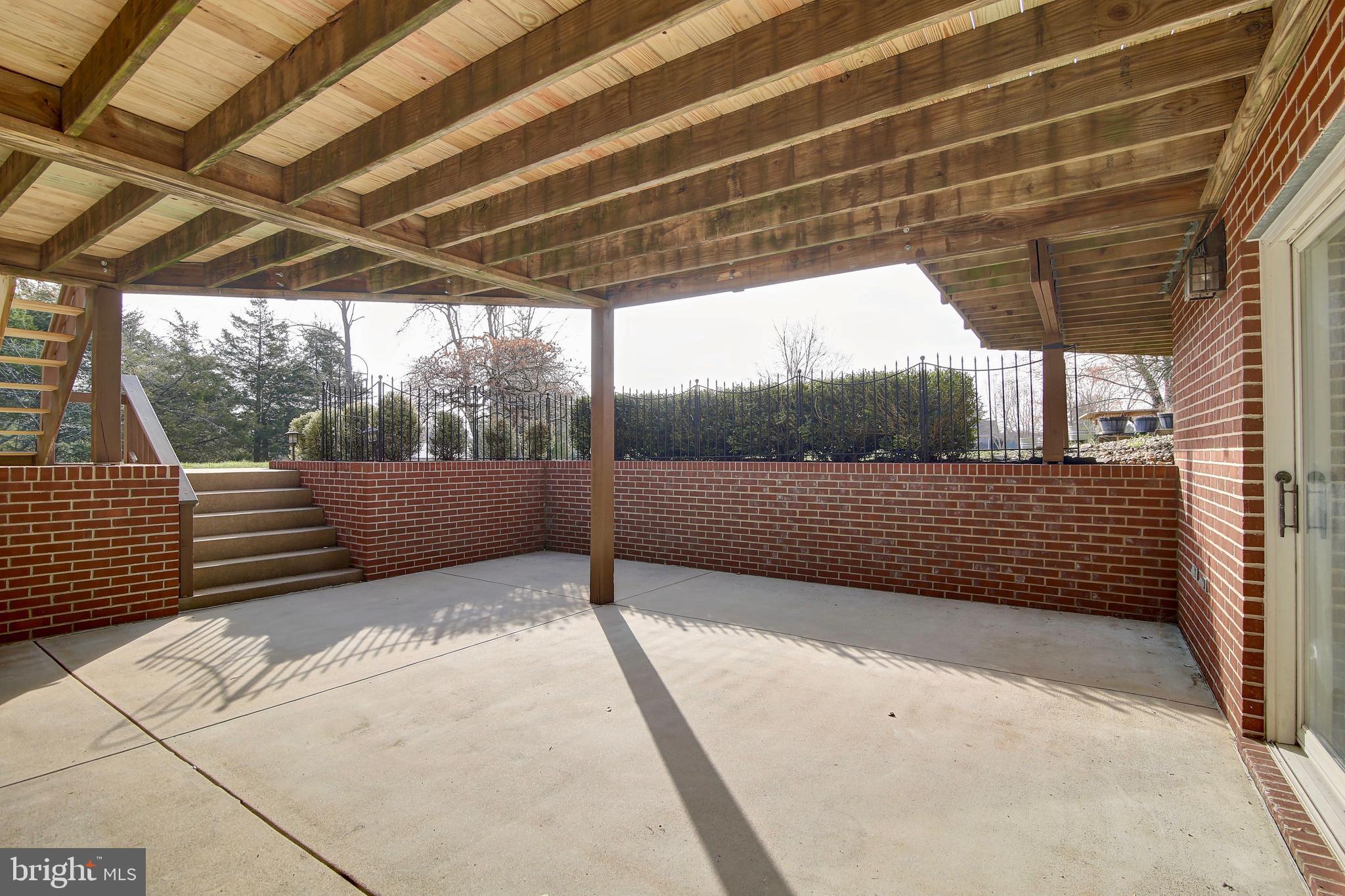 19990 Gleedsville Road Leesburg, VA 20175 - Photo 40 of 53 Built-in patio under the updated deck.