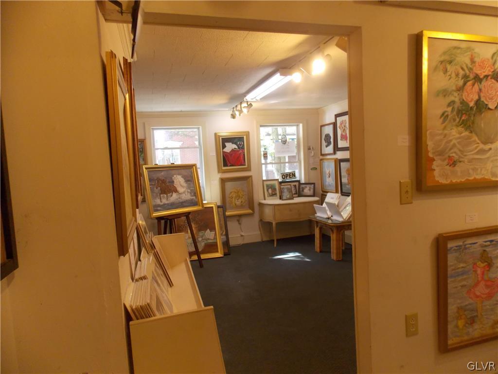 86 Broadway Jim Thorpe, PA 18229 - Photo 4 of 17 a view of a livingroom with workspace and a window