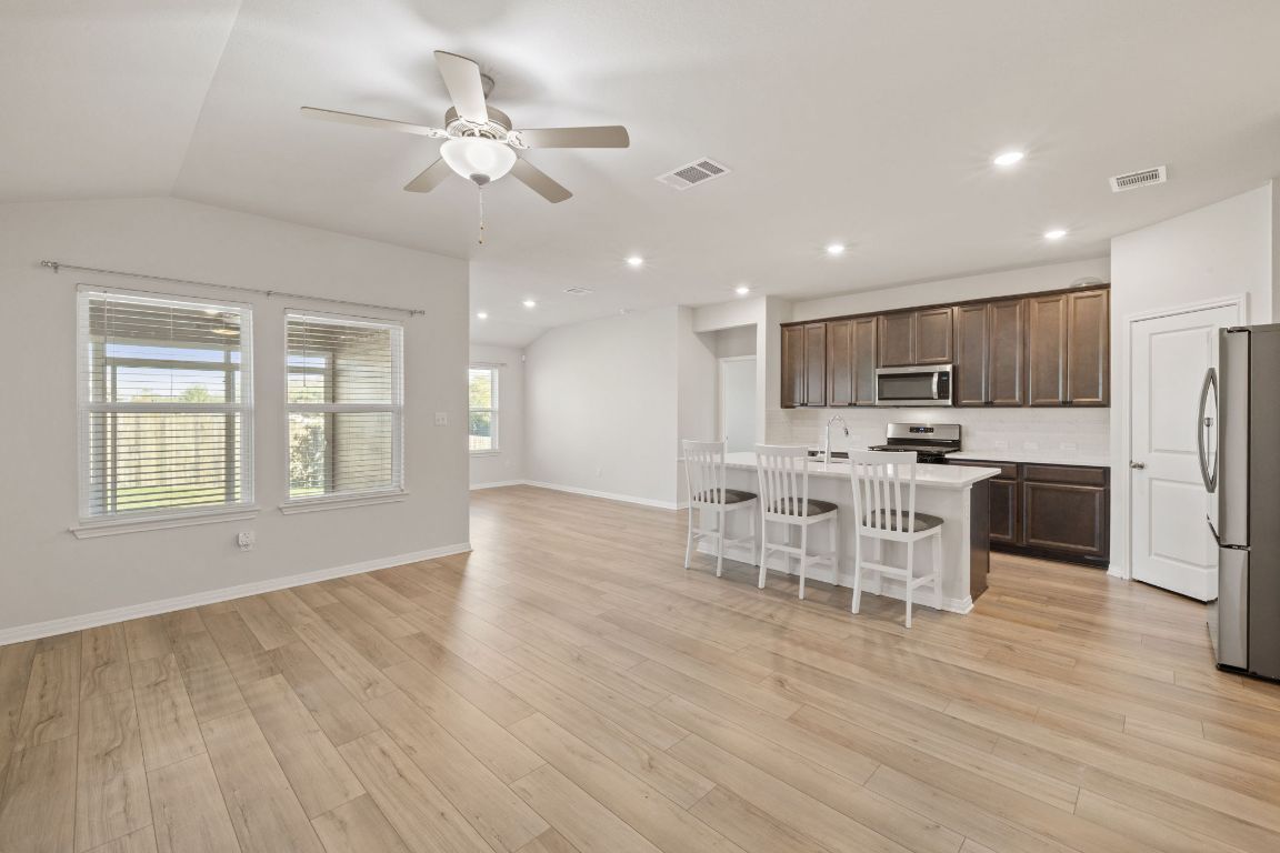 700 Autumn Stem Place Austin, TX 78748 - Photo 36 of 36 a view of a kitchen with sink stainless steel appliances and cabinets