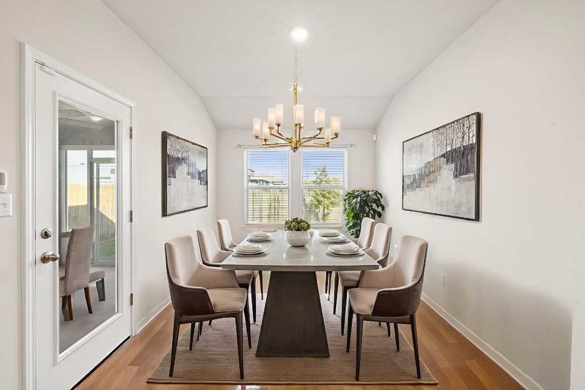 700 Autumn Stem Place Austin, TX 78748 - Photo 24 of 36 a view of a dining room with furniture and window