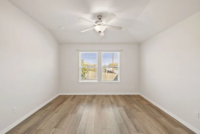a view of kitchen with wooden floor