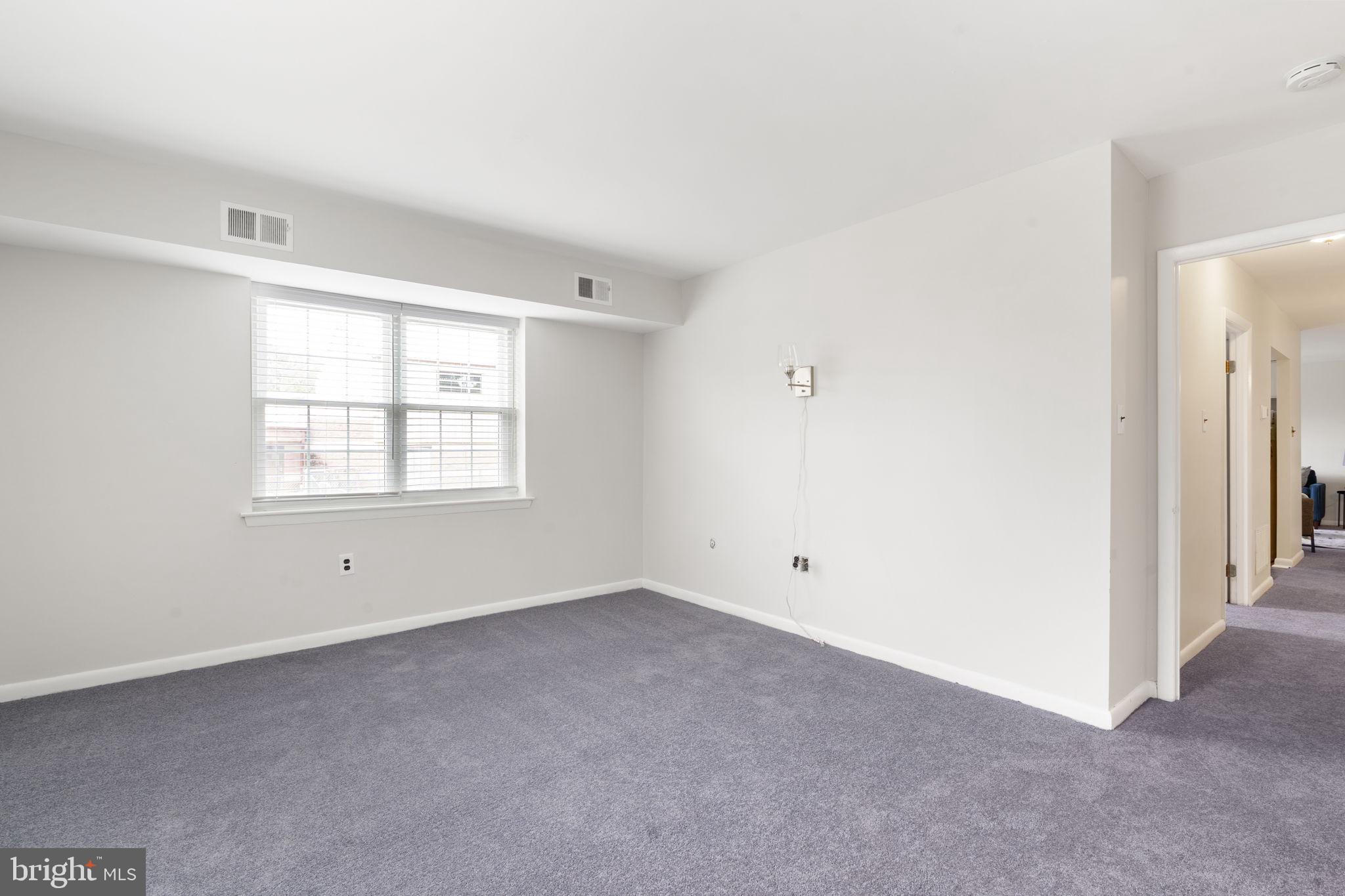 814 South Avenue, Unit J6 Secane, PA 19018 - Photo 9 of 15 an empty room with windows