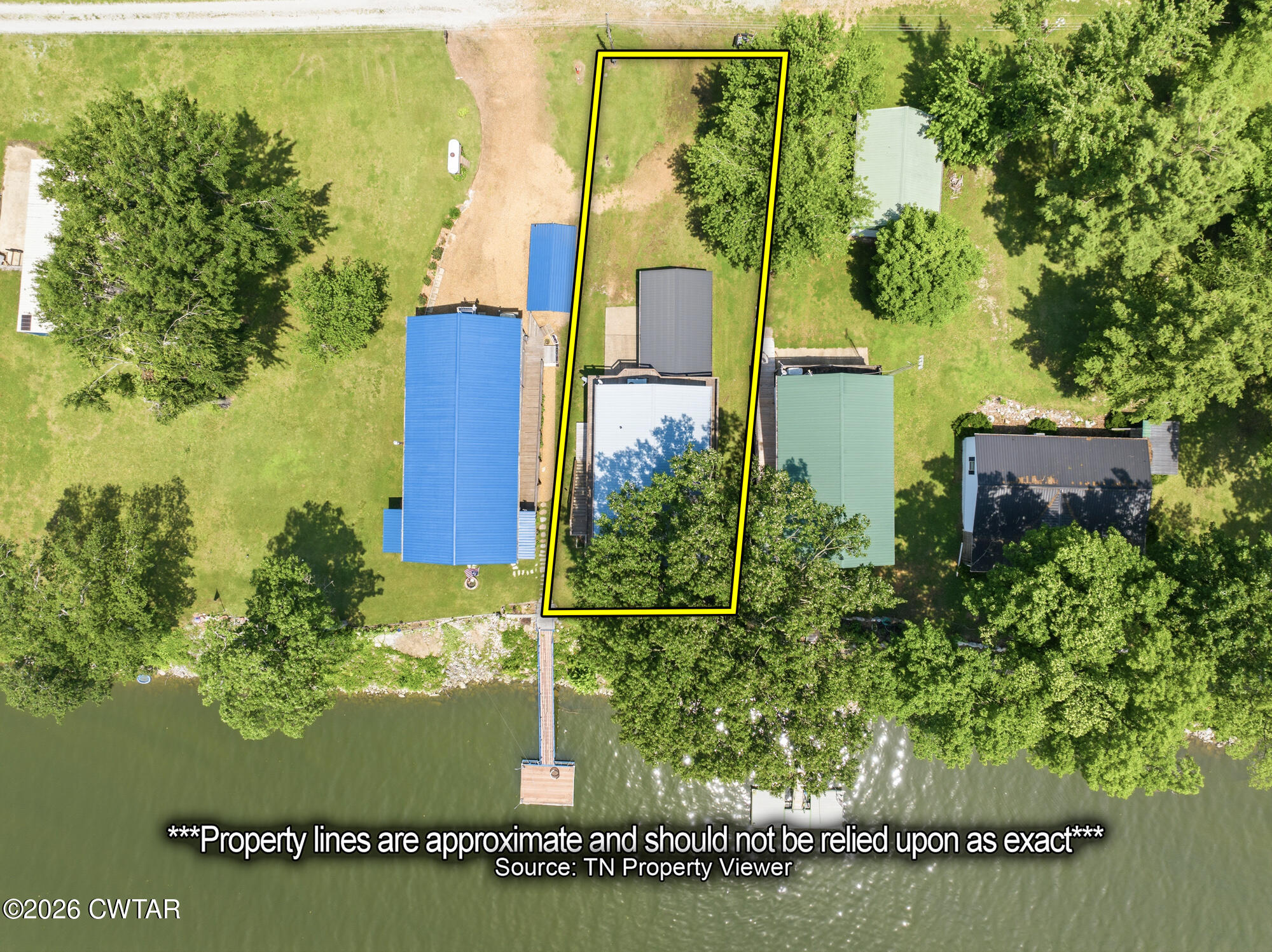 1728 Yarbro Landing Lane Decaturville, TN 38329 - Photo 41 of 44 an aerial view of a house with a yard
