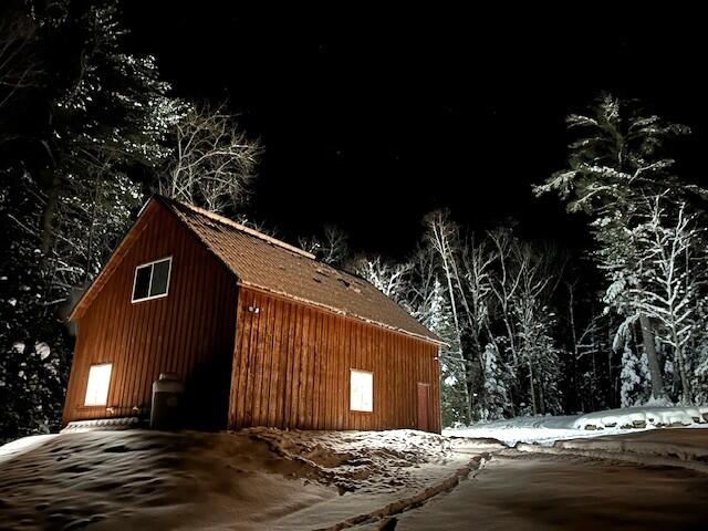 23 Quick Stream Drive Strong, ME 04983 - Photo 4 of 57 Garage winter night