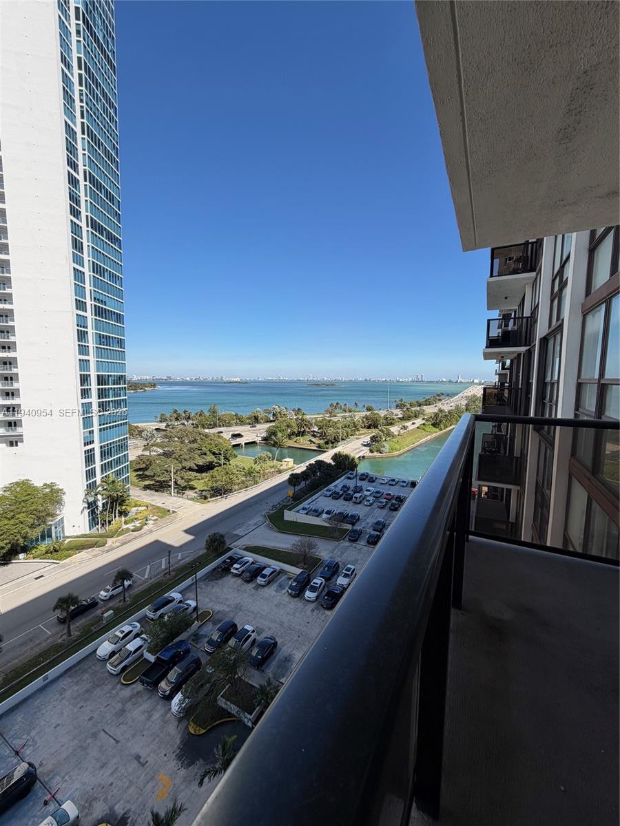 a view of balcony with furniture