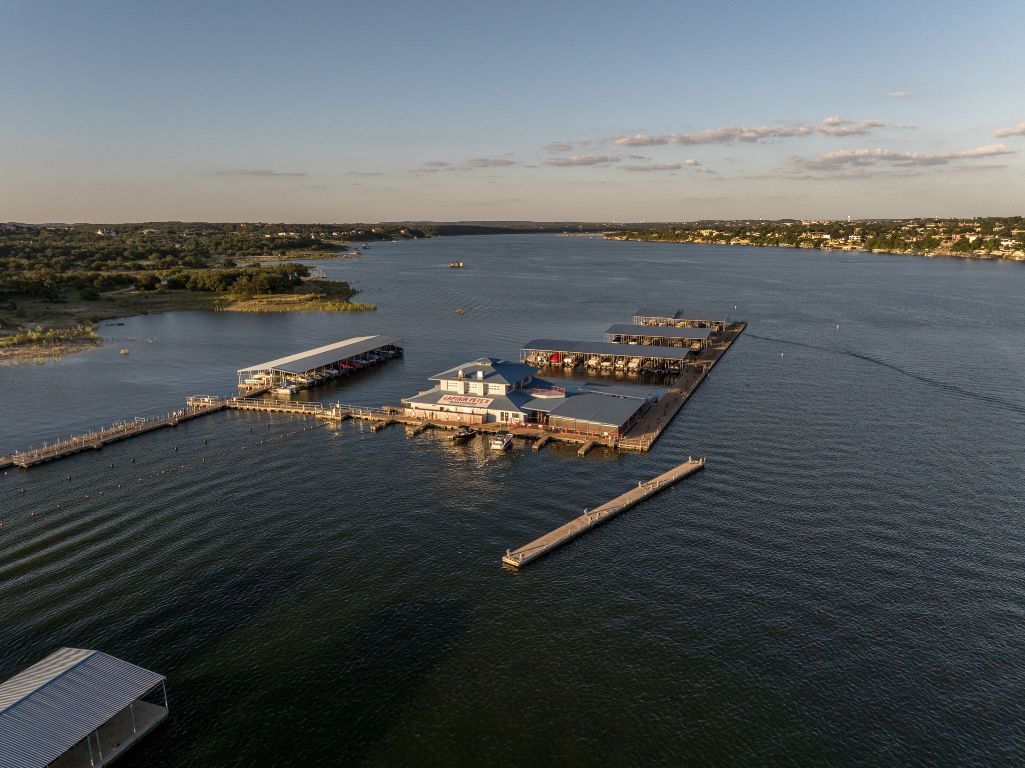 160 Lakefront Drive Point Venture, TX 78645 - Photo 16 of 21 an aerial view of a house with a ocean view