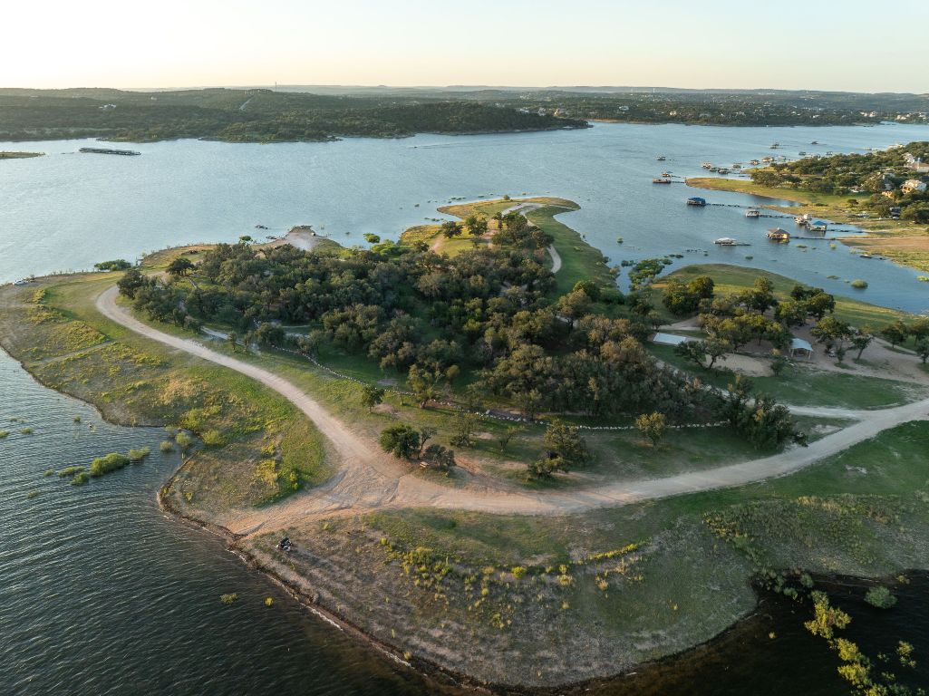 160 Lakefront Drive Point Venture, TX 78645 - Photo 20 of 21 a view of a lake with outdoor space