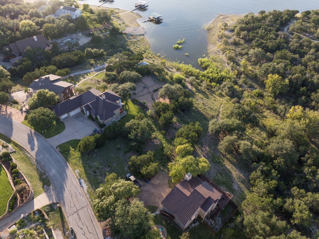 160 Lakefront Drive Point Venture, TX 78645 - Photo 4 of 21 an aerial view of a house with a yard