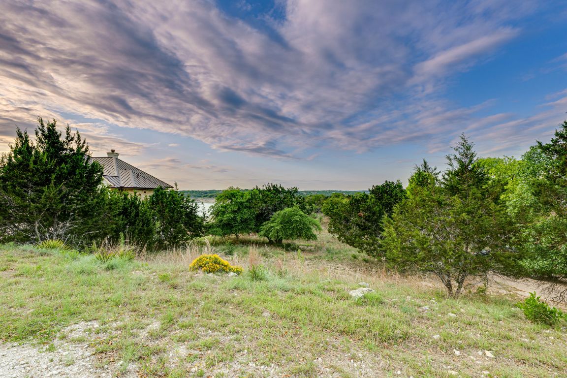 160 Lakefront Drive Point Venture, TX 78645 - Photo 6 of 21 a view of swimming pool from a yard