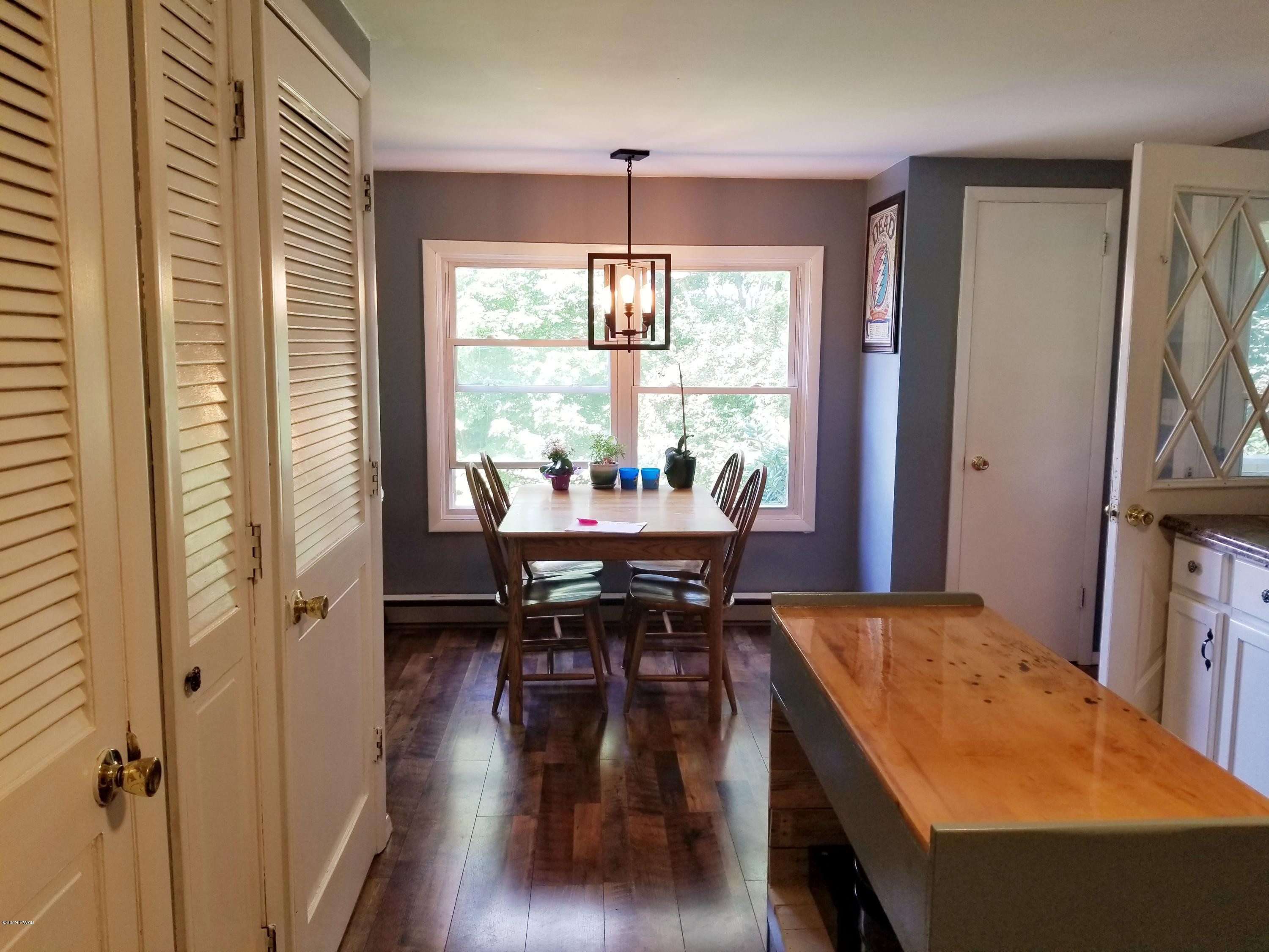 144 Mid Valley Road Lake Ariel, PA 18436 - Photo 5 of 55 a dining room with furniture and a window