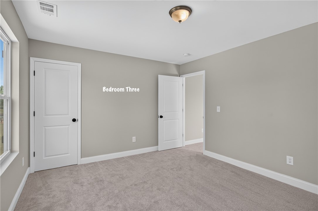 2007 Aberdeen Lane Walhalla, SC 29691 - Photo 25 of 41 An airy bedroom with fresh carpeting awaits your personal touch.