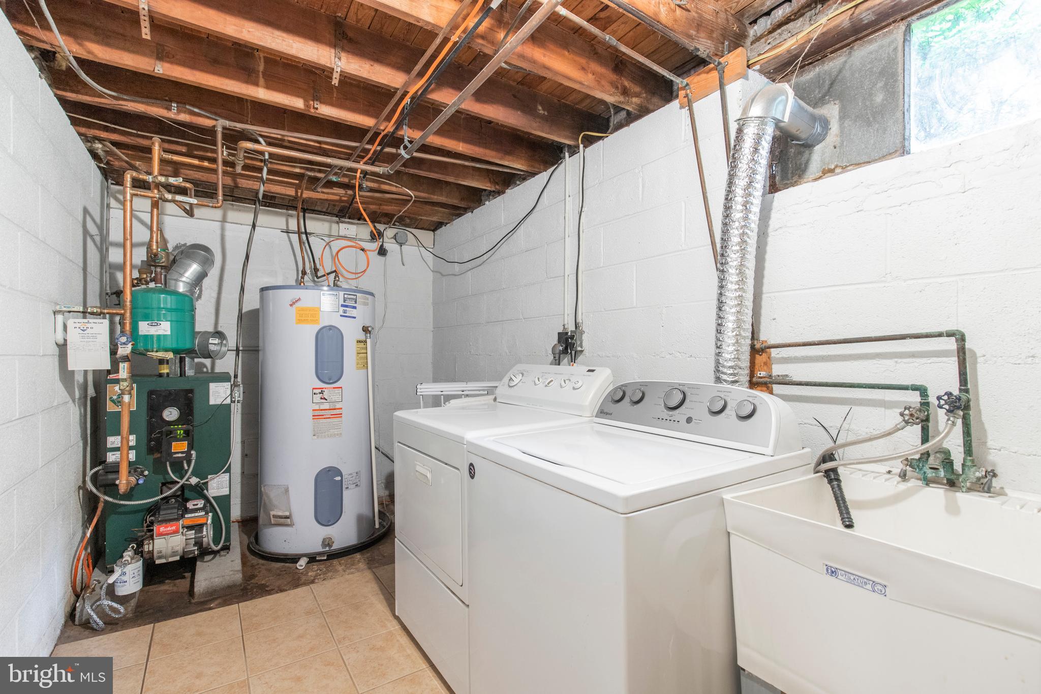 620 Upper Weadley Road Wayne, PA 19087 - Photo 25 of 31 Basement laundry room with access to 2 car garage