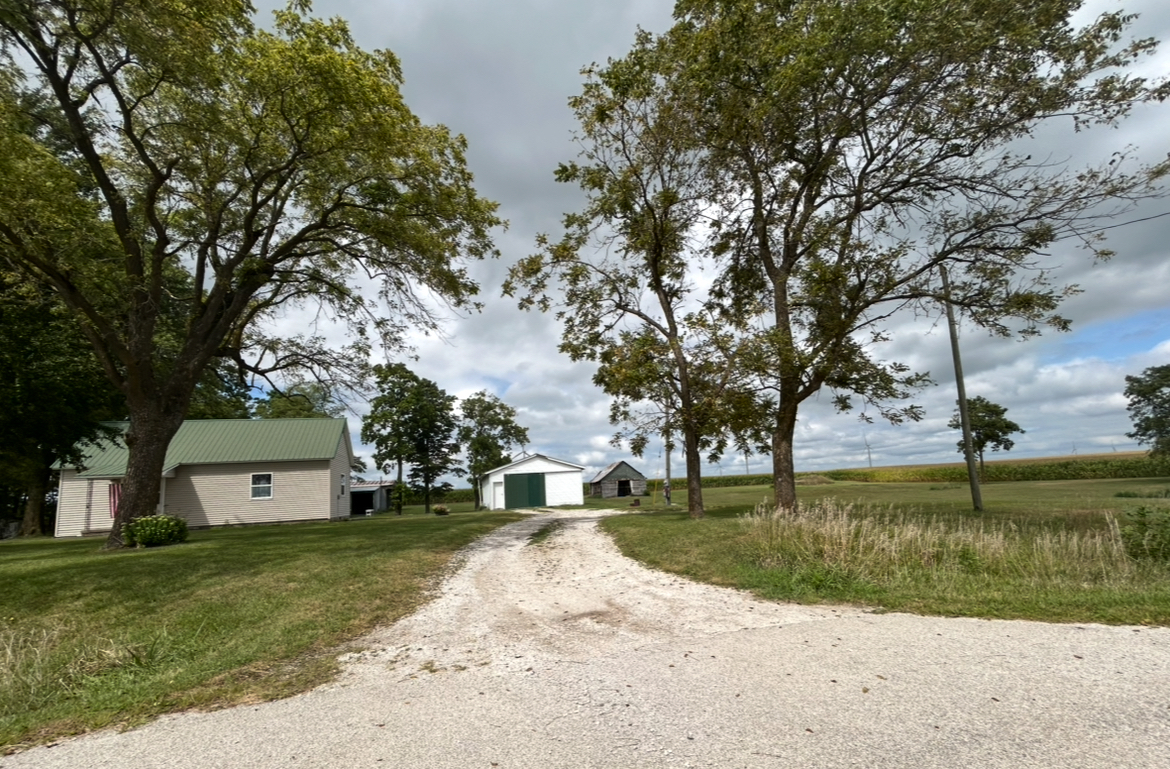 2943 East 2500 North Road Armstrong, IL 61812 - Photo 1 of 1 a view of a garden with a tree