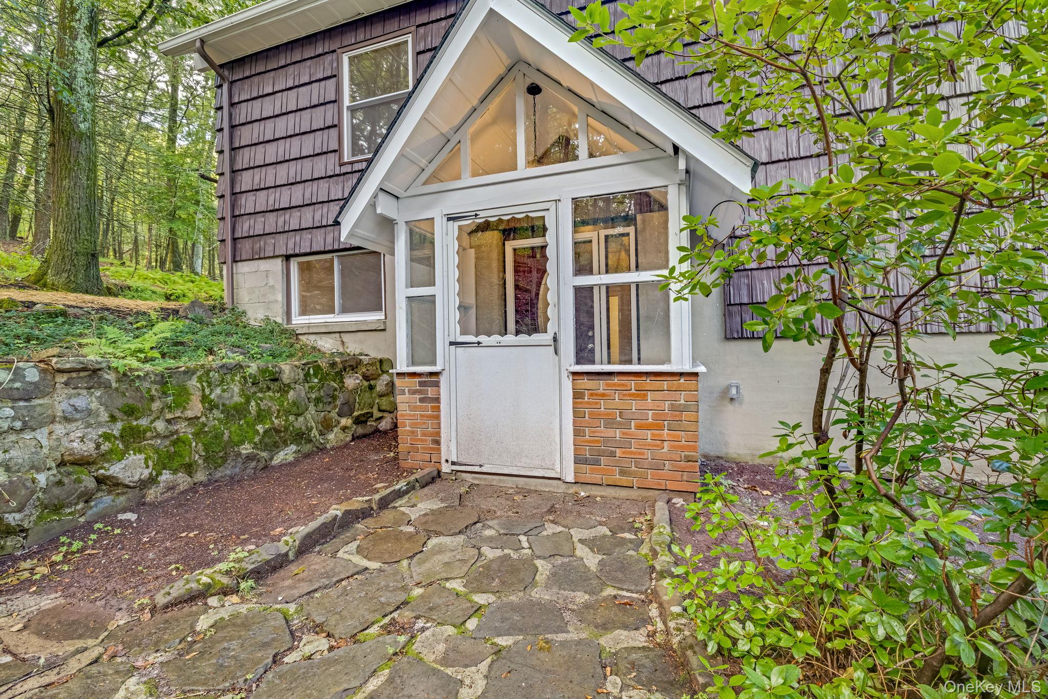 53 West Corbett Road Montgomery, NY 12549 - Photo 19 of 41 a front view of a house with a garden
