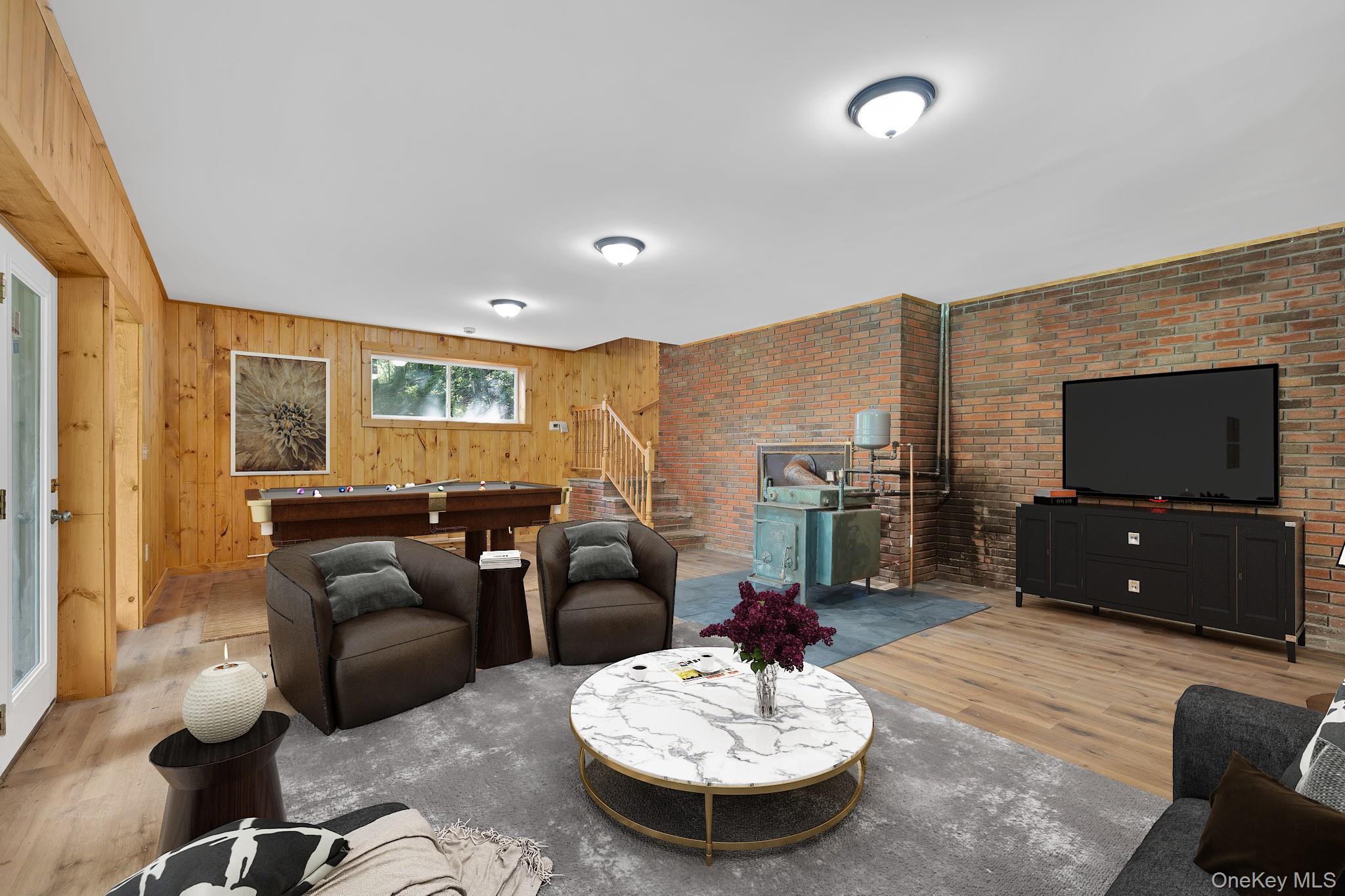 53 West Corbett Road Montgomery, NY 12549 - Photo 24 of 41 a living room with furniture and a flat screen tv