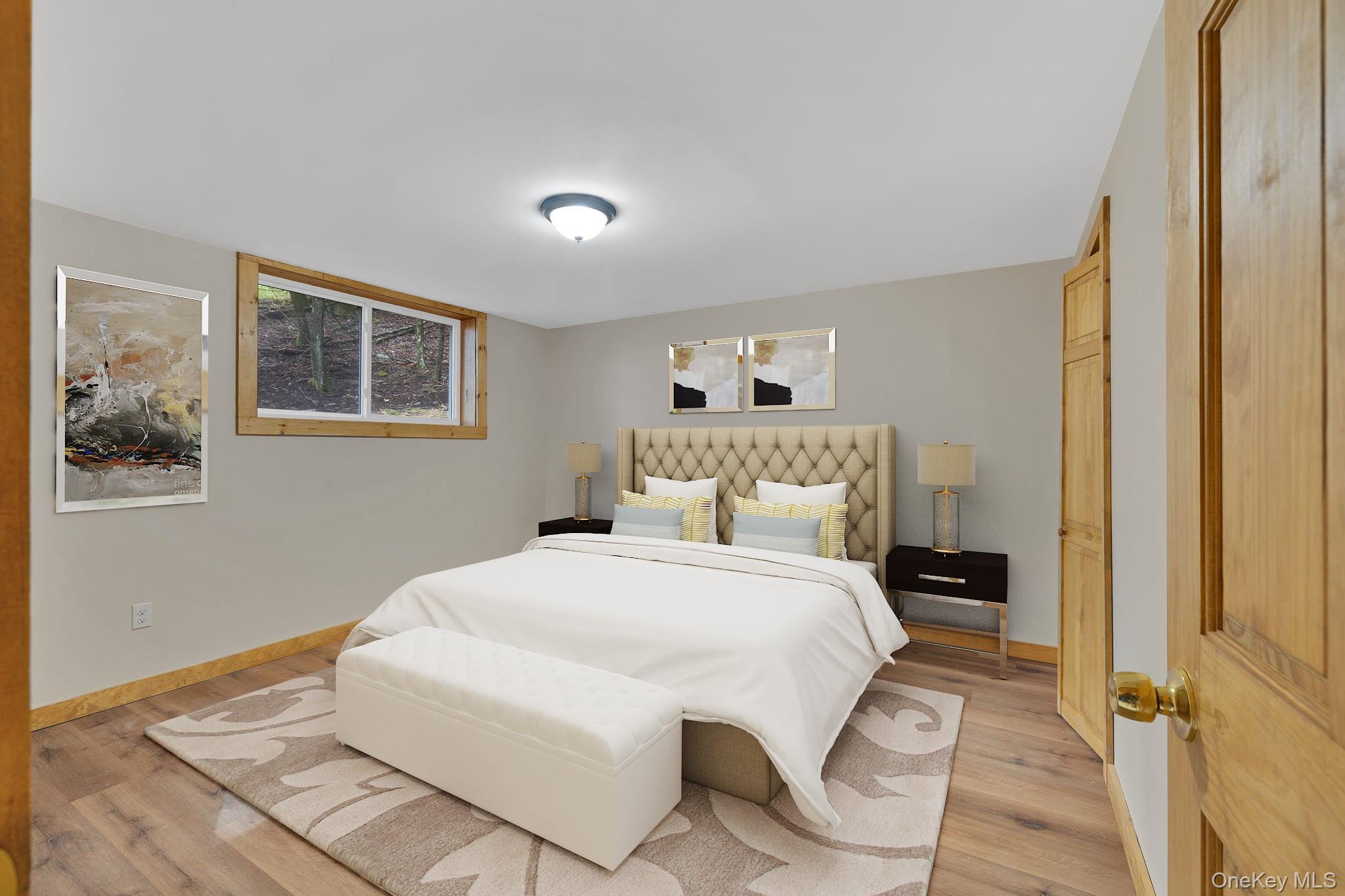 53 West Corbett Road Montgomery, NY 12549 - Photo 9 of 41 a bedroom with a bed and a painting on the wall