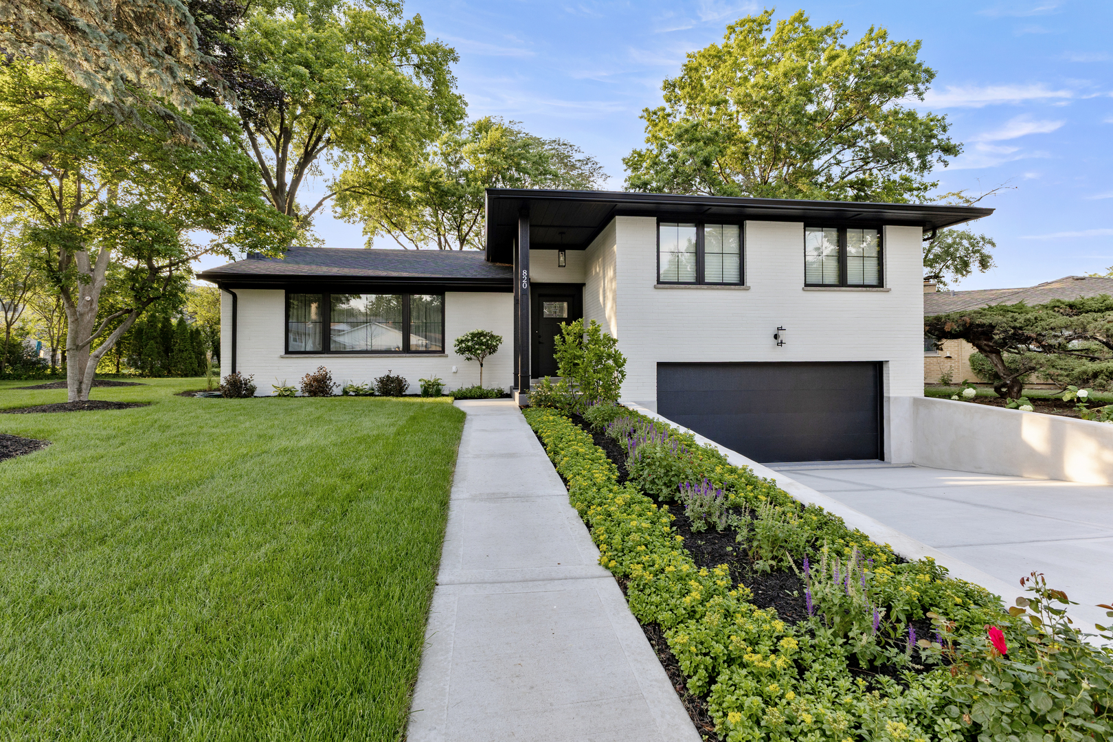 820 North Merrill Street Park Ridge, IL 60068 - Photo 1 of 1 a front view of a house with a yard