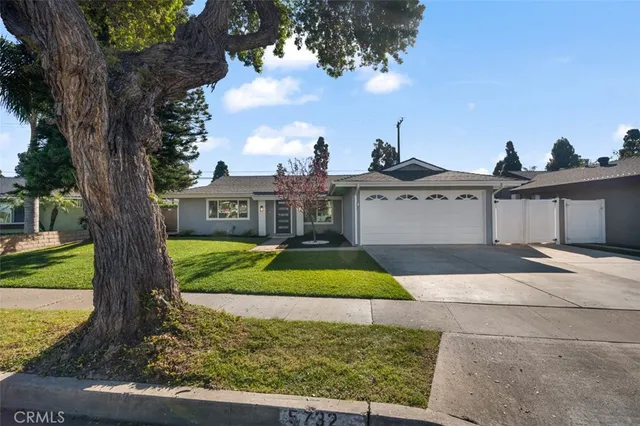a house view with a garden space